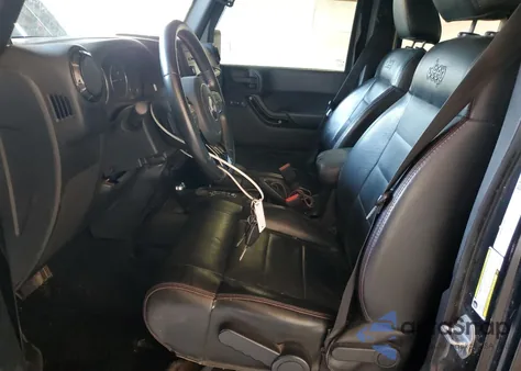 2012 Jeep Wrangler Unlimited Sahara z USA, uszkodzony, nr VIN 1C4BJWEG4CL269670